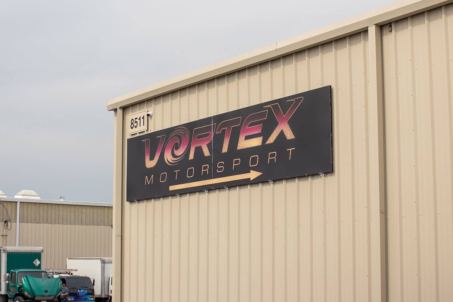 The Vortex Motorsport sign on the shop at 8511 Sunstate Street, Tampa